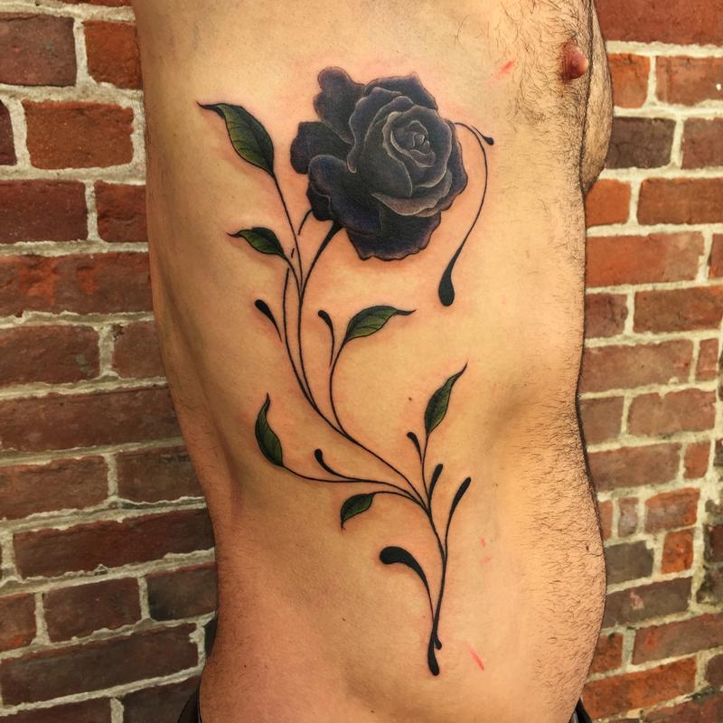 Black Rose Tattoo On Man Right Side Rib