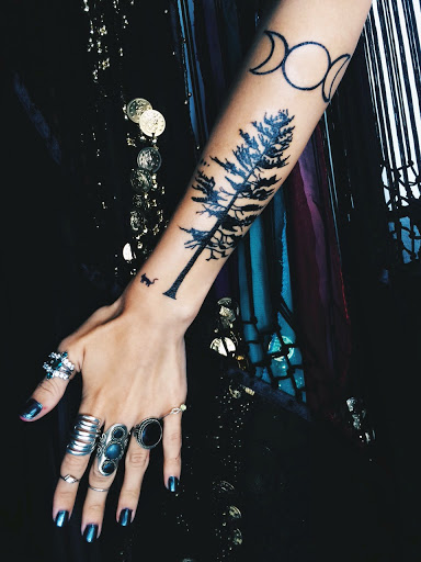 Black Tree Tattoo On Girl Left Forearm