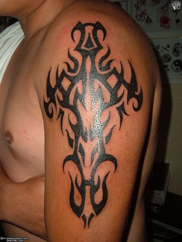 Black Tribal Cross Tattoo On Man Left Half Sleeve