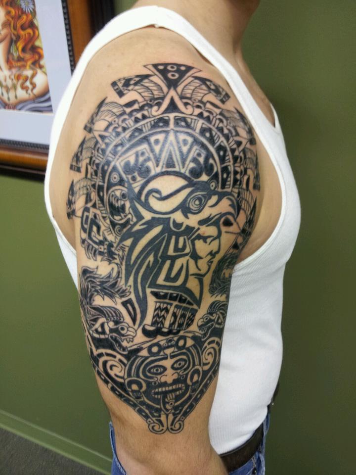 Black Tribal Tattoo On Man Right Half Sleeve