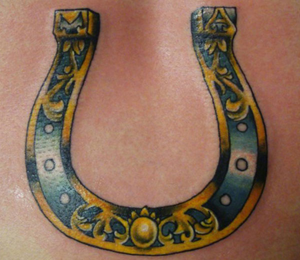 Blue And Yellow Ink Horse Shoe Tattoo