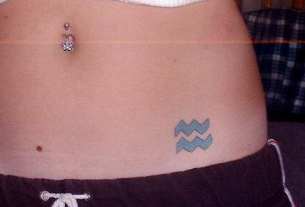 Blue Ink Aquarius Tattoo On Left Hip