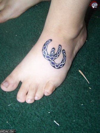 Celtic Horse Shoe Tattoos On Left Foot