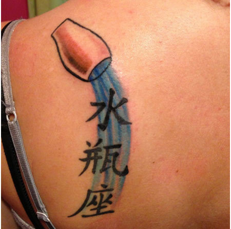 Chinese Symbols And Aquarius Tattoo On Left Back Shoulder