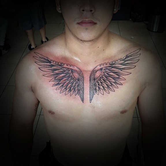 Classic Black And Grey Wings Tattoo On Man Chest