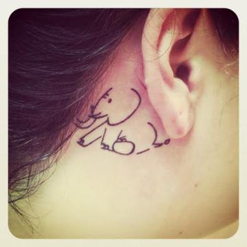 Classic Black Outline Elephant Tattoo On Girl Behind The Ear