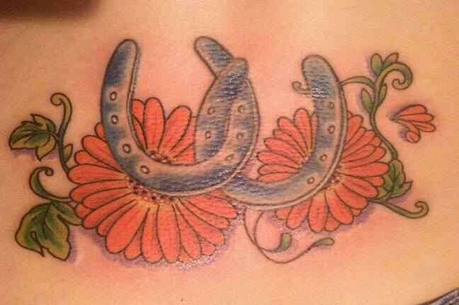 Color Flower And Horseshoe Tattoos