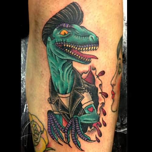 Color Ink Dinosaur Tattoo On Arm