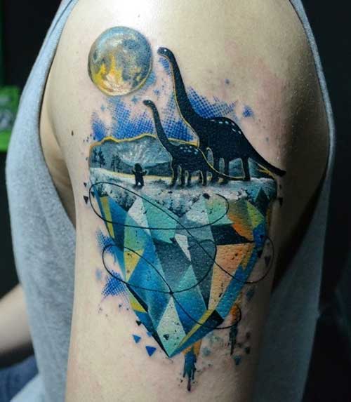 Colored Abstract Dinosaur Tattoo On Left Shoulder