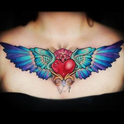 Colorful Heart With Wings Tattoo On Girl Chest