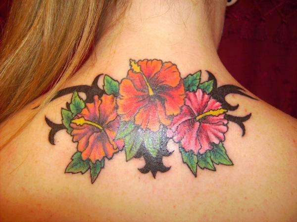 Colorful Hibiscus Flowers Tattoo On Girl Upper Back