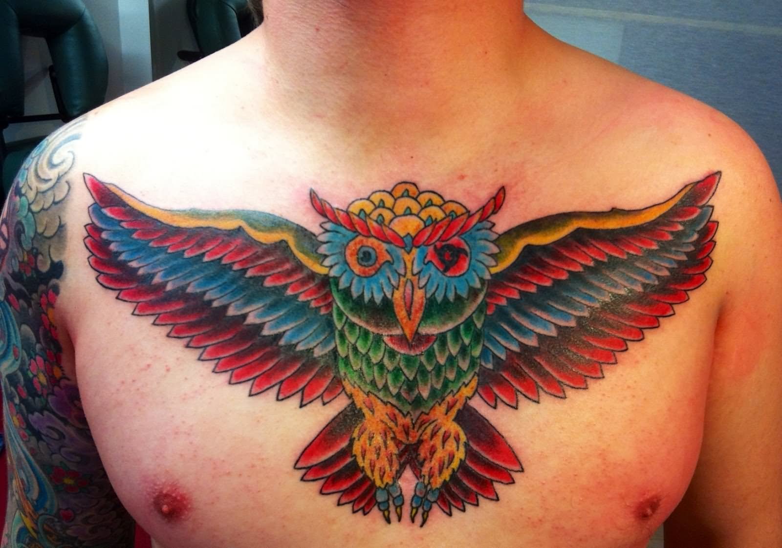 Colorful Owl Tattoo On Man Chest