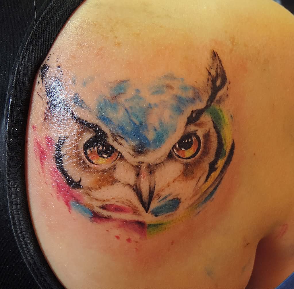 Colorful Watercolor Owl Face Tattoo On Right Back Shoulder By Facundo Pereyra