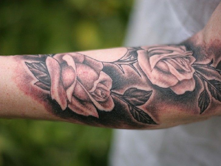 Cool Black Ink Roses Tattoo On Right Forearm