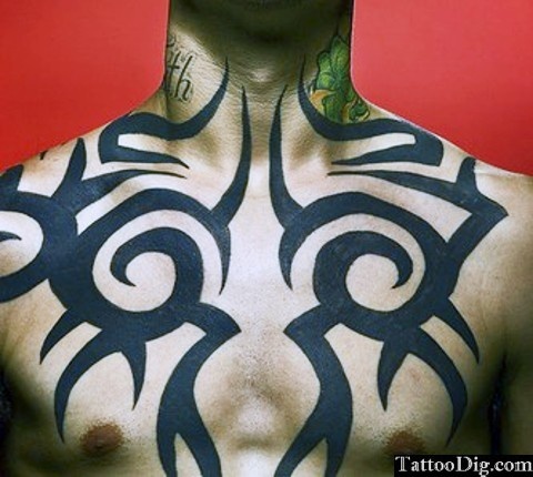 Cool Tribal Design Tattoo On Man Chest