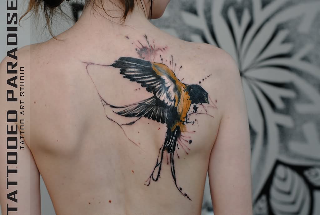 Cool Watercolor Flying Bird Tattoo On Girl Right Back Shoulder