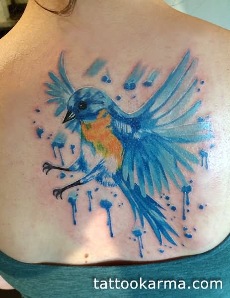 Cool Watercolor Flying Bird Tattoo On Upper Back