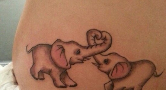 Cute Two Elephant Trunk Up Tattoo Design
