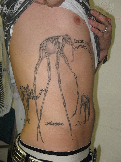 Dali Elephant Tattoo On Man Right Side Rib