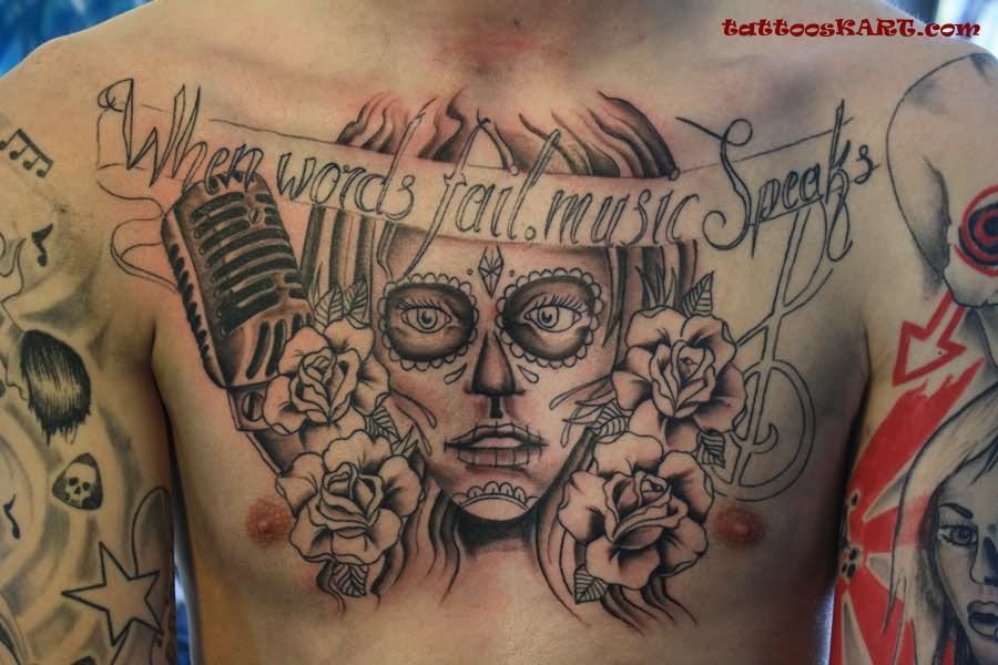 Dia De Los Muertos Face With Roses And Banner Tattoo On Man Chest