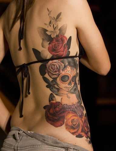Dia De Los Muertos Girl Face With Roses Tattoo On Girl Right Side Rib