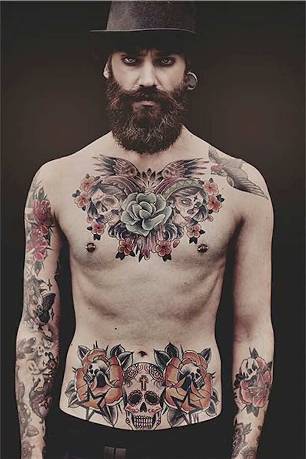 Dia De Los Muertos With Skull And Flowers Tattoo On Man Chest