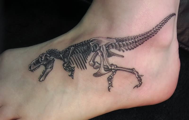Dinosaur Skeleton Tattoo On Left Hand