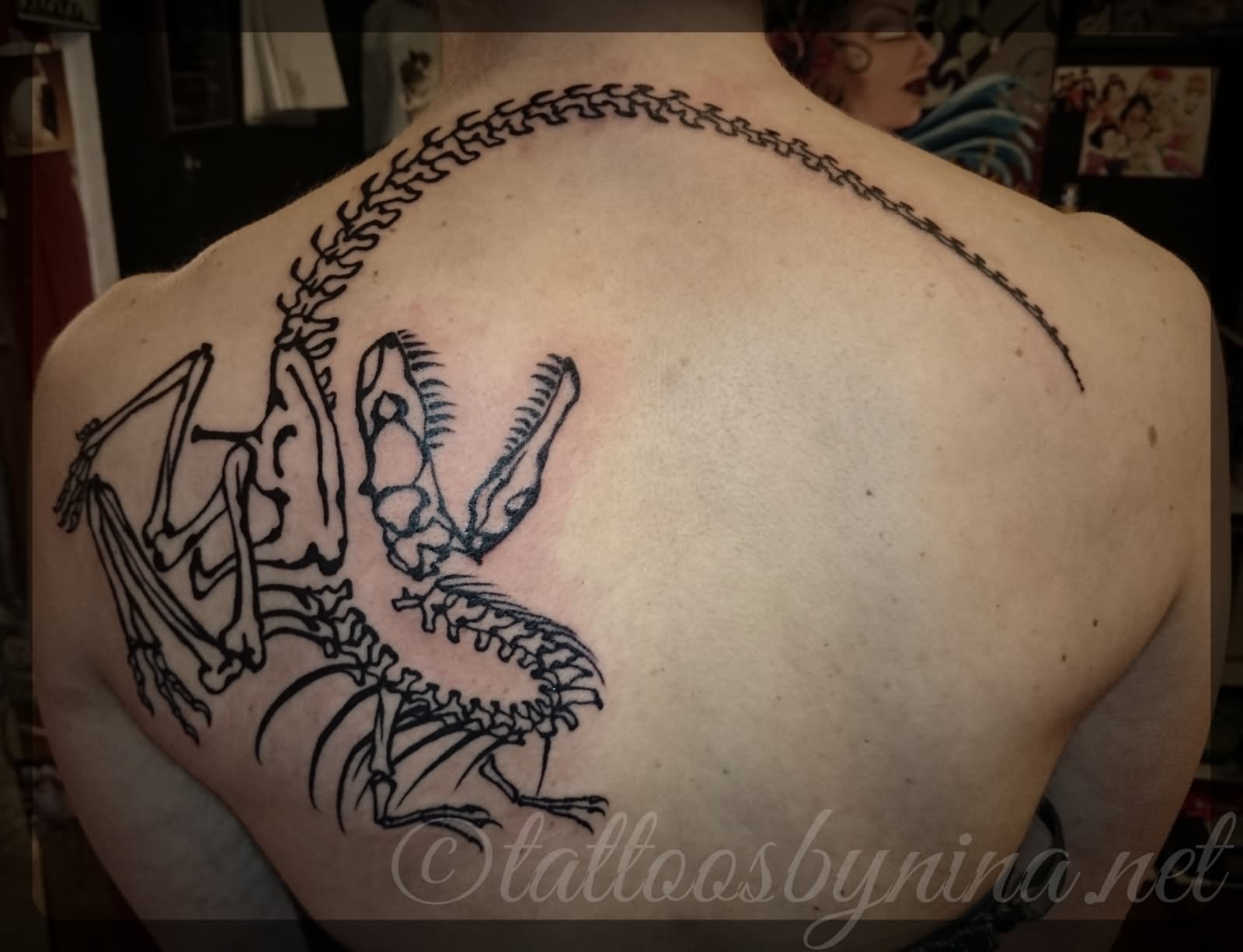 Dinosaur Tattoo On Left Back Shoulder