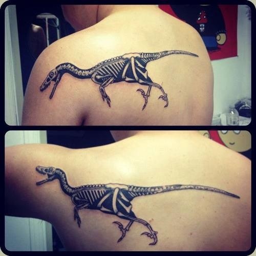 Dinosaur Tattoo On Man Left Back Shoulder