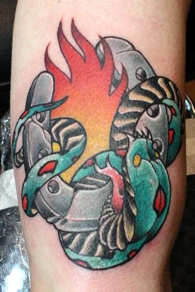 Flaming Horseshoe And Snake Tattoo On Bicep