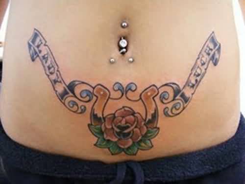 Flower And Horseshoe Tattoo On Belly