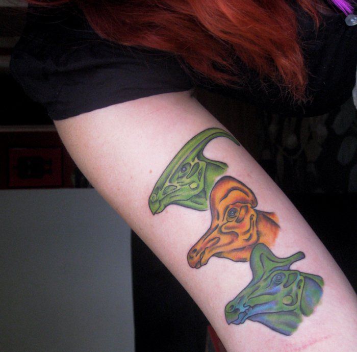 Girl Right Bicep Dinosaur Tattoo