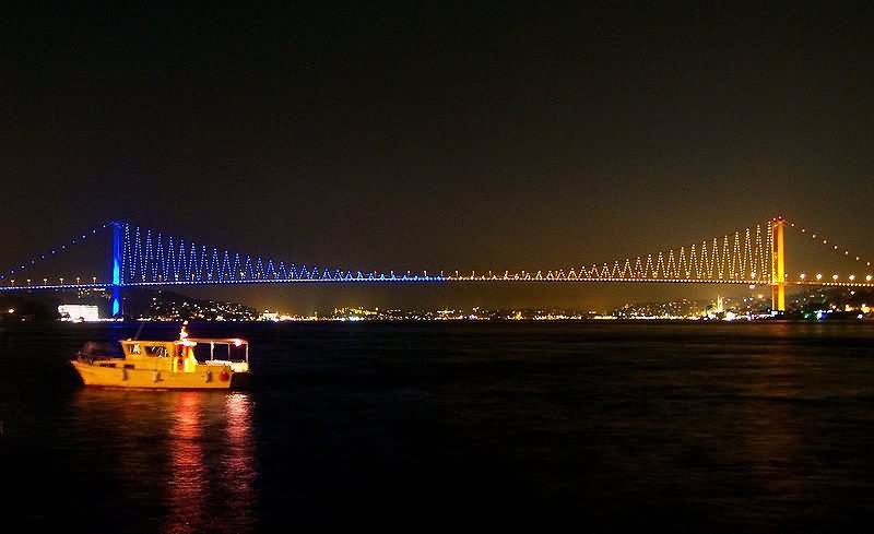 Golden And Blue Nights On The Bosphorus Bridge In Istanbul