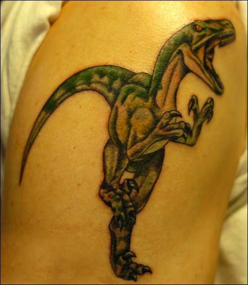 Green Dinosaur Tattoo On Shoulder