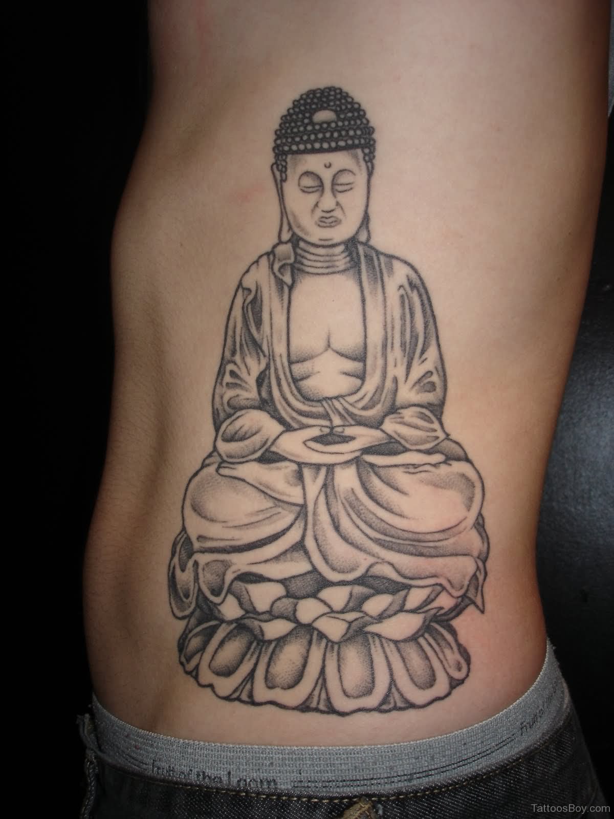 Grey Ink Buddha Tattoo On Man Side