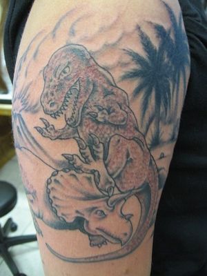 Grey Ink Dinosaur Tattoo On Right Half Sleeve