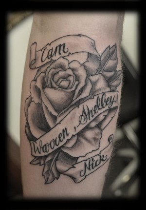 Grey Ink Rose With Banner Tattoo Design For Forearm
