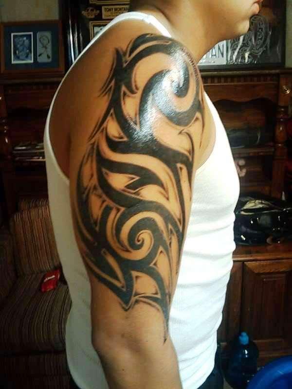 Half Sleeve Tribal Tattoo For Men
