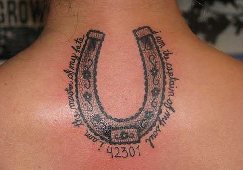 Horse Shoe Tattoo On Upper Back