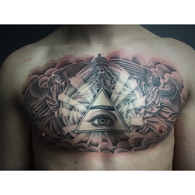 Illuminati Eye With Clouds Tattoo On Man Chest.