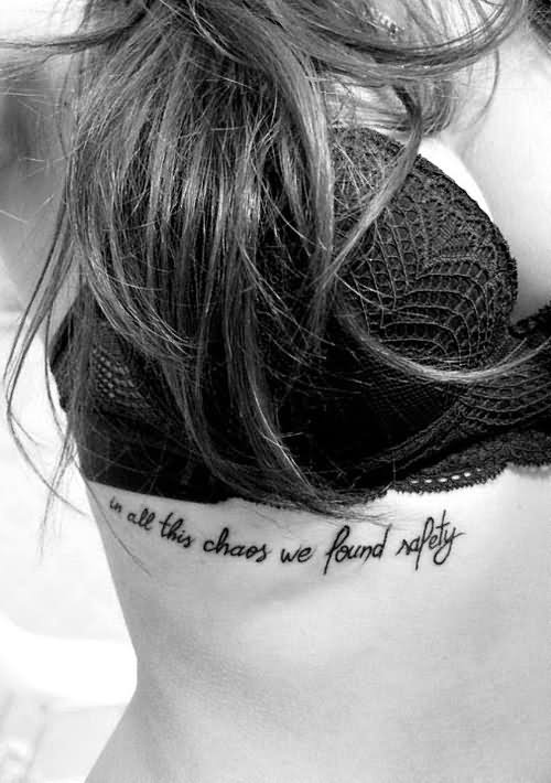 In All This Chaos We Found Safety Quote Tattoo On Girl Side Rib