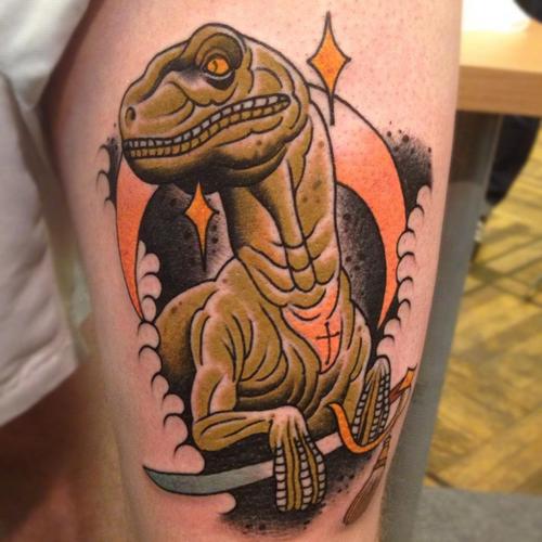 Left Thigh Dinosaur Tattoo For Men