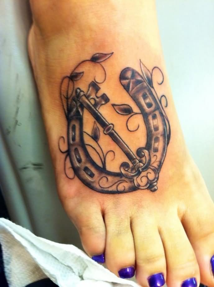Lock Key And Horse Shoe Tattoo On Right Foot