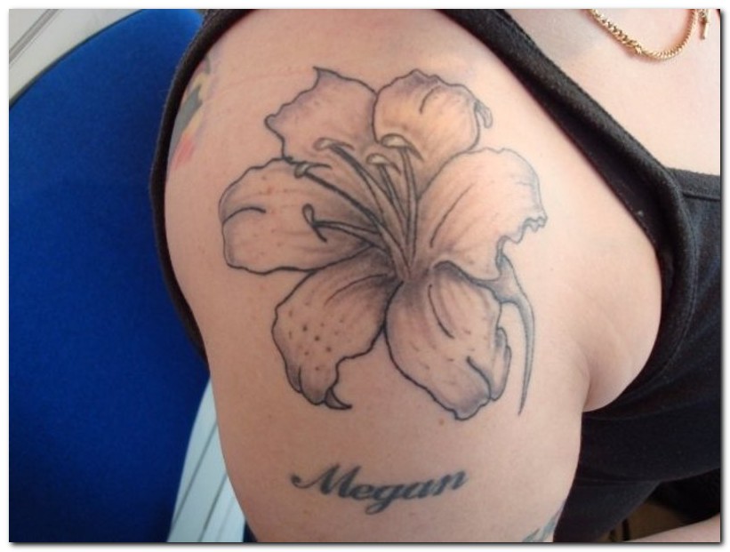 Megan - Grey Ink Hibiscus Flower Tattoo On Right Back Shoulder