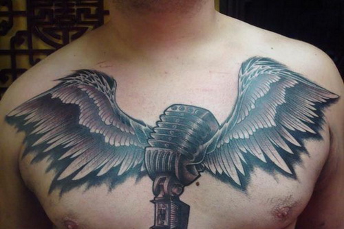 Mic With Wings Tattoo On Man Chest
