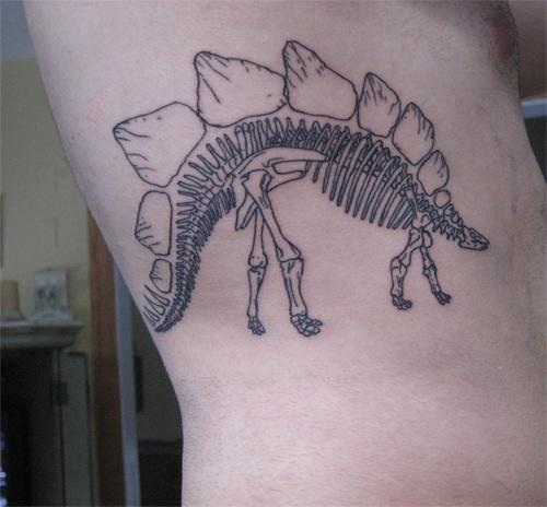 Nice Dinosaur Skeleton Tattoo On Side Rib