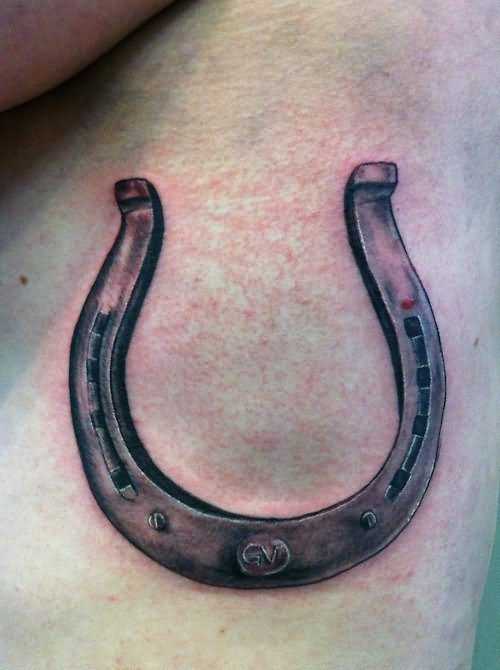 Nice Grey Horse Shoe Tattoo On Rib Side
