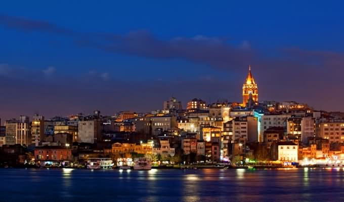Night View Of The Galata Tower Across The Bosphorus River