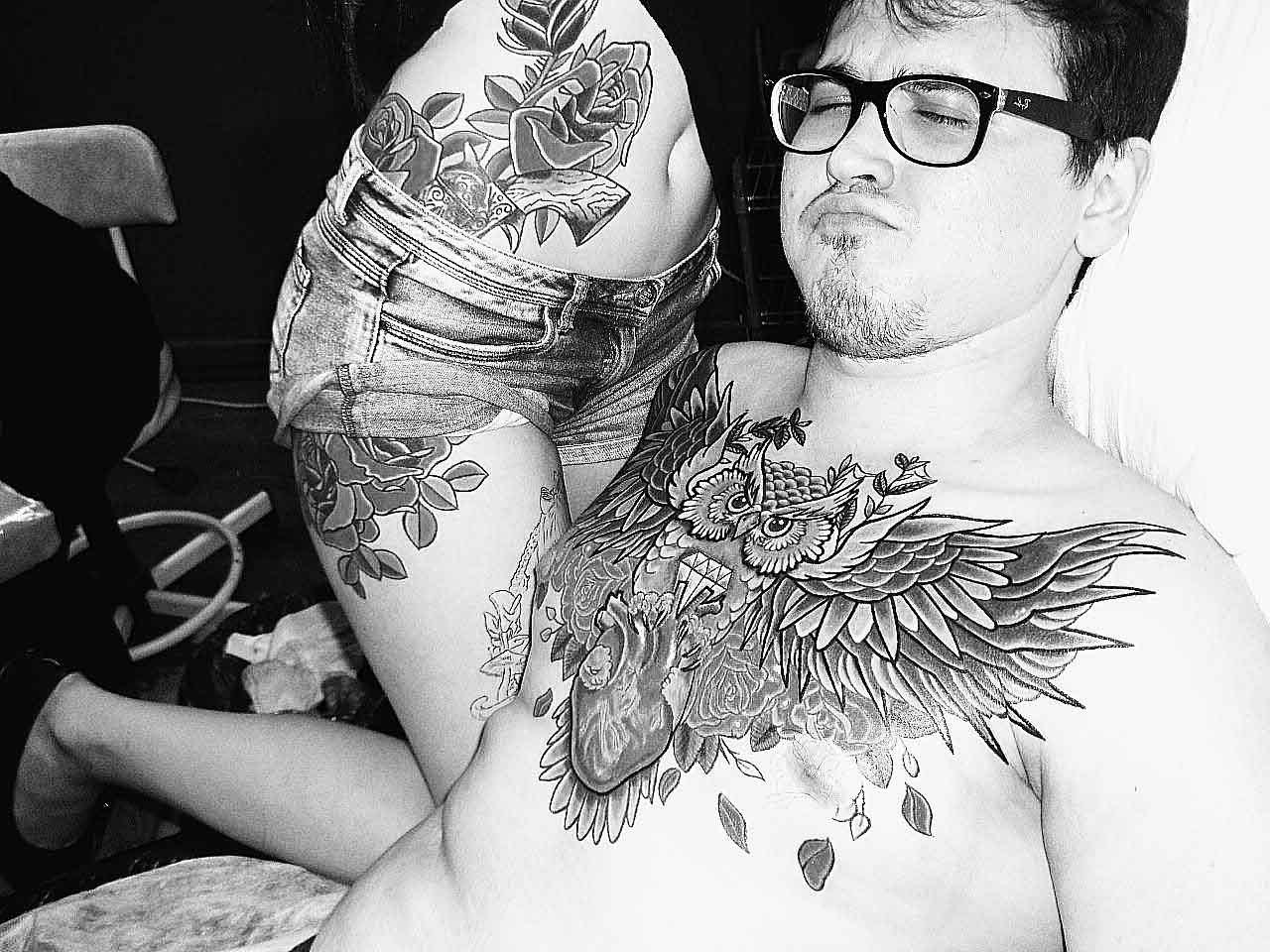 Owl With Real Heart Tattoo On Man Chest