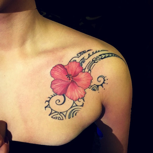 Pink Ink Hibiscus Flower With Tribal Design Tattoo On Left Front Shoulder